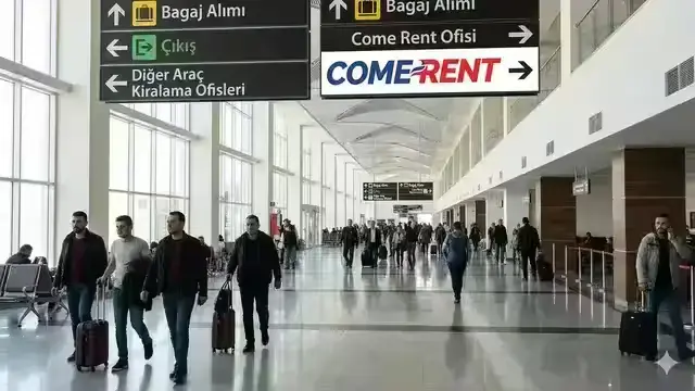 Elazığ Havalimanı terminal içi yön tabelasında Come Rent oku ve ofis yönü